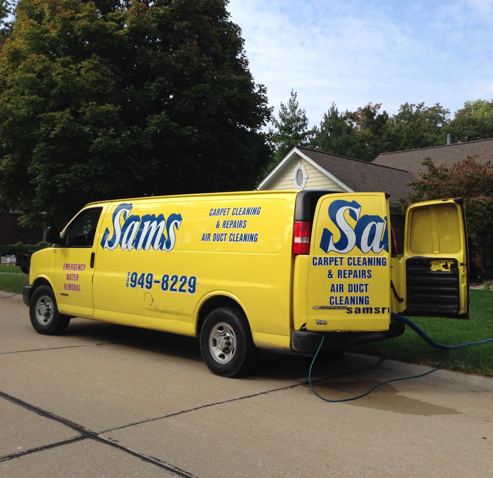 You Can t Miss the Yellow Sams Vans Sams Carpet Cleaning in St