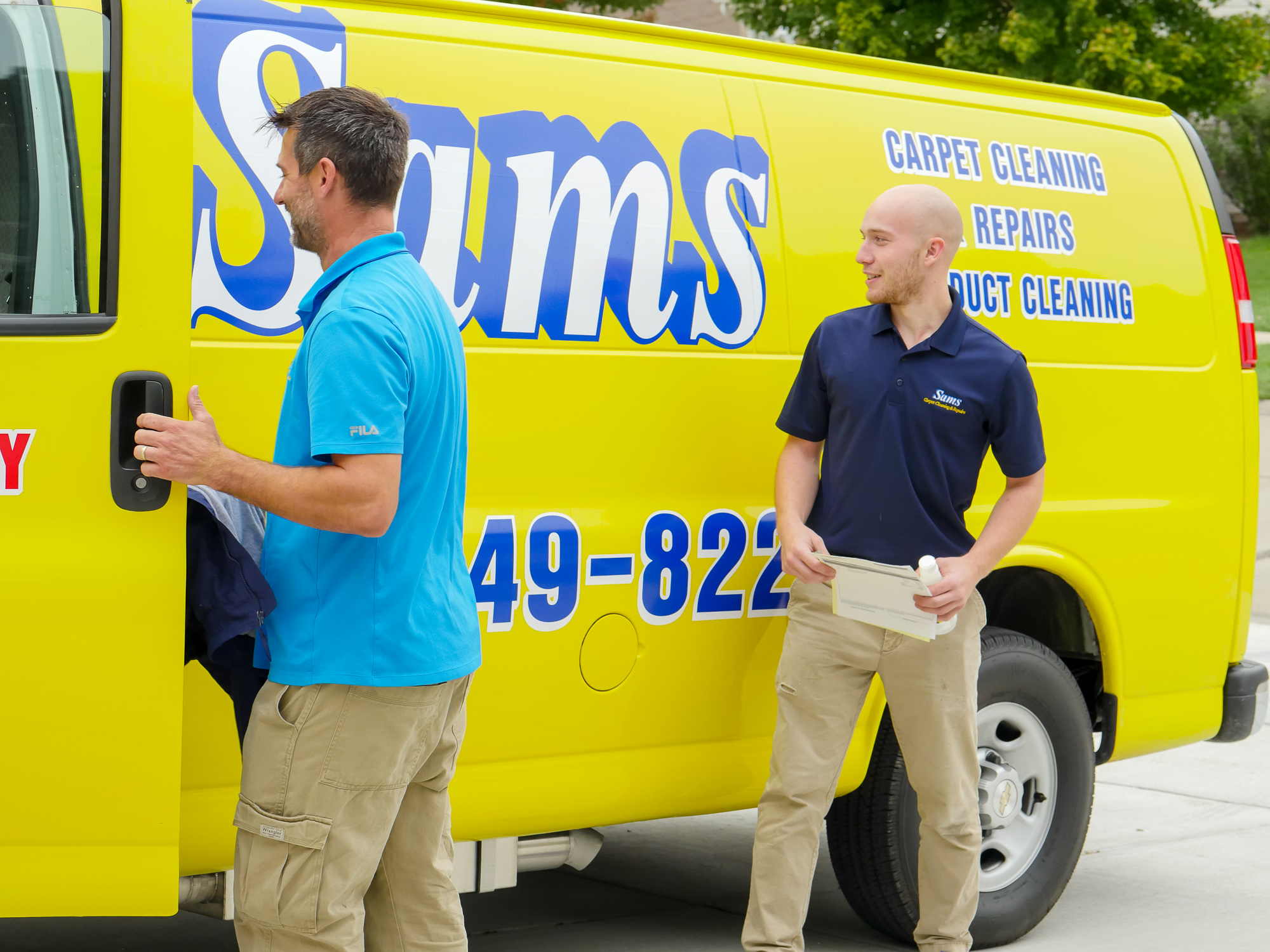 Sams carpet cleaning and repair professionals arriving to inspect Berber carpet damage for repair