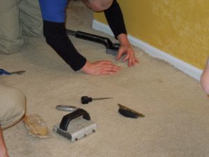 carpet seam repair and restretching