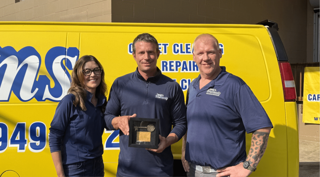 Sams Carpet Cleaning Team with key to the City of St Charles