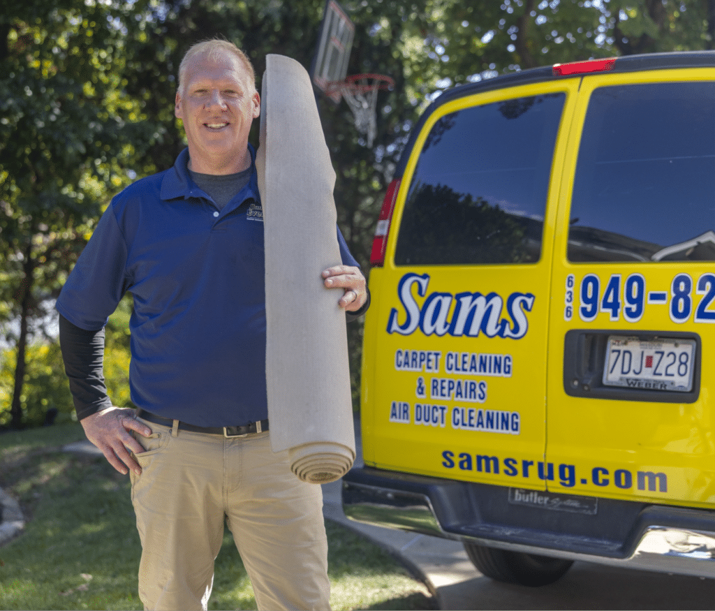 Sams Employee with Area Rug