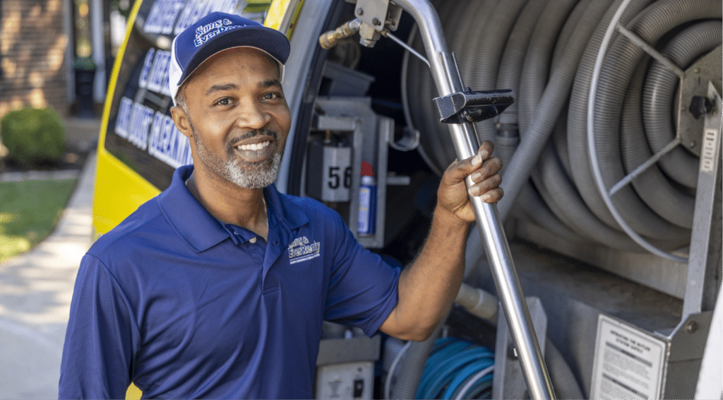 Sams Employee with Cleaning Equipment